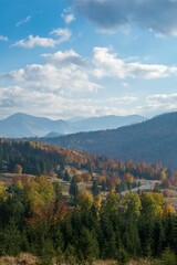 Scenic rural landscape featuring lush green grass and rolling hills