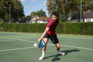 Man playing pickleball