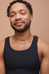 Studio portrait of happy handsome man