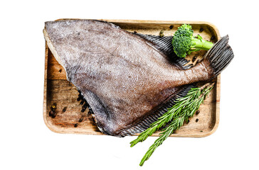Raw fresh John Dory fish on a wooden tray with rosemary and broccoli.  Isolated, Transparent...