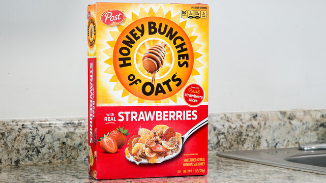 NORWALK, CT, USA - FEBRUARY 6, 2024:  Box with sweetened cereal with oats and honey and real strawberries from Post brand