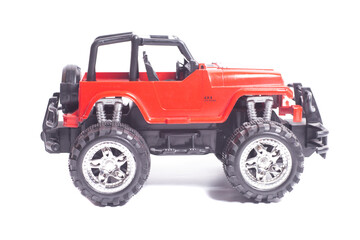 radio-controlled offroad 4x4 toy car isolated on white background