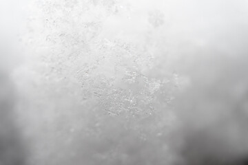 Snow texture with snowflakes and ice crystals