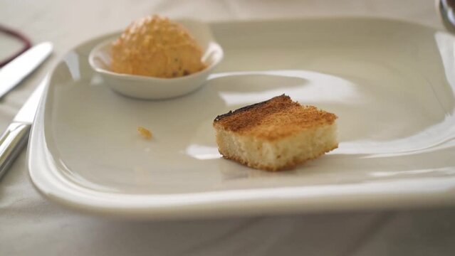 Herb butter and toast bite in a luxory restaurant
