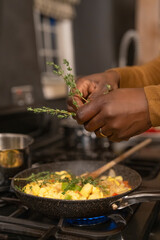 Senior man preparing food in kitchen