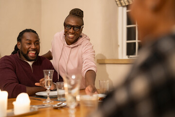 Family eating dinner together at home