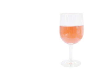 pink sparkling wine with frothy in drinking glass isolated on white background