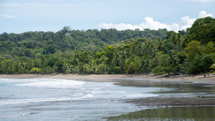 Waves crashing on a wild beach in Costa Rica - 731804530