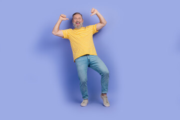 Full length photo of confident assertive retired person wear yellow t-shirt jeans directing at himself isolated on violet color background