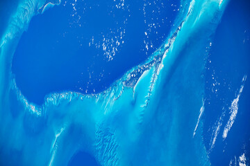 Turquoise sea water in the Bahamas. Digital enhancement of an image by NASA