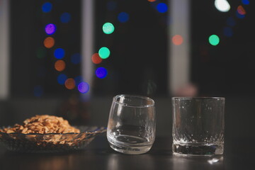 Celebration night, pour whiskey into a glass. Give to friends who come to celebrate