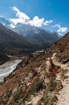 View of the Himalayas and river Imja Khola. View of mountains and stream during trekking from Dingboche to Pangboche in Sagarmatha, Nepal in a clear day. Three passes trek or Everest Base Camp EBC.