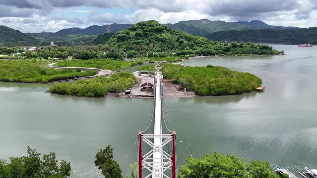 Suspension bridge for crossing

connecting Puyahan Village with Cemara Village. Lombok - NTB - Indonesia