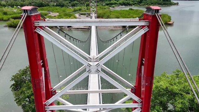Suspension bridge for crossing

connecting Puyahan Village with Cemara Village. Lombok - NTB - Indonesia