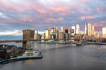 View of Brooklyn Bridge at sunrise in New York. USA