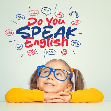 Beautiful cute little girl with eyeglasses looking at the illustrations and do you speak English text above her head.  Foreign language learning concept.