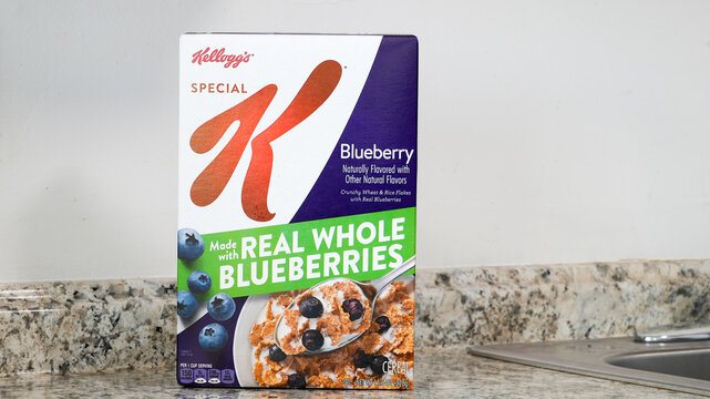 NORWALK, CT, USA - FEBRUARY 6, 2024:  Box with crunchy whet and rice flakes with real blueberries from Kellogg's brand