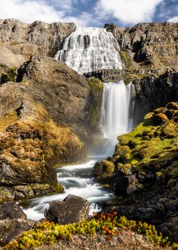 Vertical image of Dynjandi, a majestic waterfall situated in Iceland