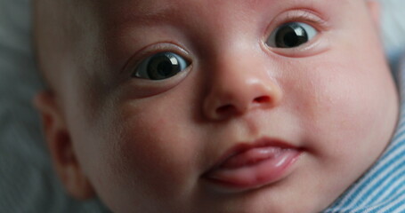 Healthy Baby portrait newborn face closeup during first months of life