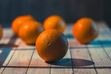 oranges on wooden table