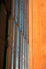 Harmonious Blend of Modernity in Brown and Orange Architectural Facades. Architecture background
