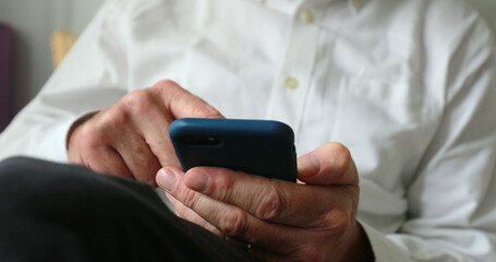 Older man using cellphone device