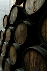 Wine casks at the winery. Stacked Wine barrels at the german winery. Old vintage whisky cask. old Single Malt