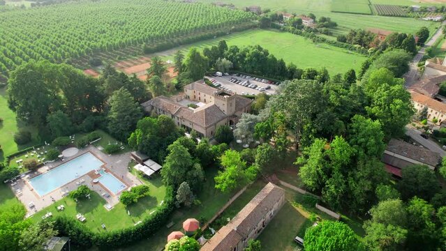 Capture the essence of summer elegance with breathtaking aerial footage of an Italian villa. Gaze upon lush landscapes and intricate architecture from a mesmerizing drone view.
