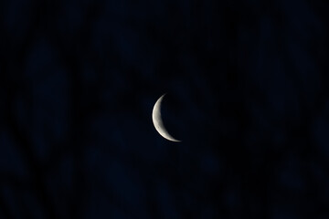 Obraz na płótnie Canvas Crescent Moon on Dusk Sky Twilight After Sundown Religion of Islamic on Ramadan Month, Eid Al Adha, Eid Al Fitr Symbol Photo, Uskudar Istanbul, Turkiye (Turkey)