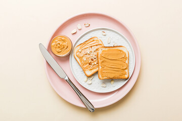 Peanut butter sandwiches or toasts on light table background.Breakfast. Vegetarian food. American cuisine top view vith copy space