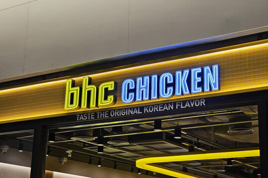 Bangkok, Thailand - February 07, 2024: BHC Chicken Sign. It is a famous Korean Fried chicken restaurant, opened the first branch in Thailand at Central World, Bangkok.