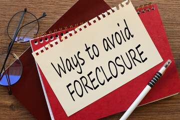 Ways To Avoid Foreclosure text on wooden block on chart background , business concept