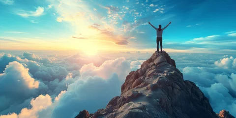 Tuinposter Triumph Atop A Peak An Empowered Man Raises Arms Brimming With Inspiration © Ян Заболотний