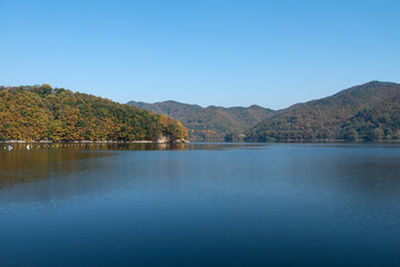 View of the lake in the autumn mountains