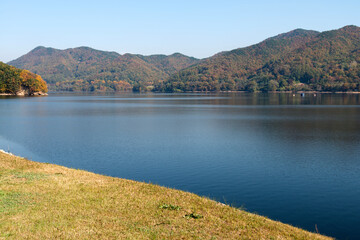 View of the lake in the autumn mountains