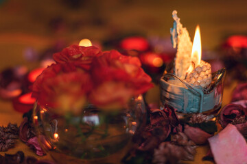 Bouquet of roses, candles and gifts, card for February 14, St. Valentine, March 8, wedding, birthday, mother's day, blurred background, bokeh.