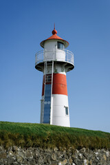Fototapeta na wymiar Skansin Lighthouse in Torshavn, Faroe Islands