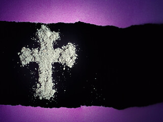 Lent Season, Holy Week, Ash Wednesday concepts.Ash cross symbol in purple and dark background.