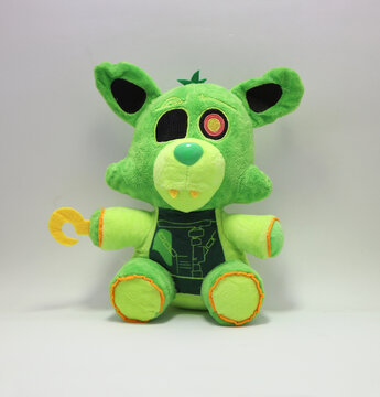 
Radioactive Foxy plush, character from the series of video games, movies and books Five Nights Final Freddy. Green fox toy for children. Isolated white.