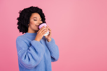 Photo of adorable dreamy lady dressed knitted sweater enjoying tea to go empty space isolated pink...