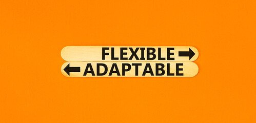 Flexible or adaptable symbol. Concept word Flexible Adaptable on beautiful wooden stick. Beautiful...