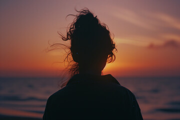 Fototapeta premium silhouette of a person on the beach