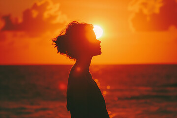 silhouette of a person in the sunset on beach