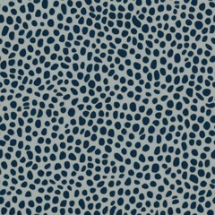 Abstract Blue Leopard Print Pattern. Seamless pattern of blue leopard spots on a muted background.