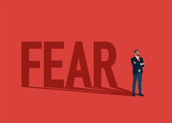 Businessman standing with shadow FEAR word. Overcoming fear concept. Flat vector illustration.