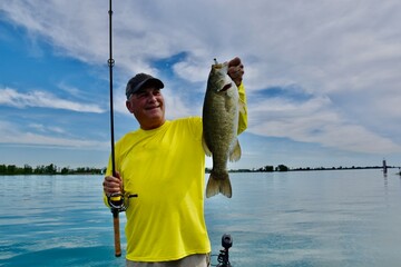Angler with a smallmouth bass 