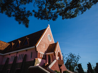 Mai Anh Domaine De Marie Church with vintage windows on brick wall, located in Da Lat, Lam Dong...