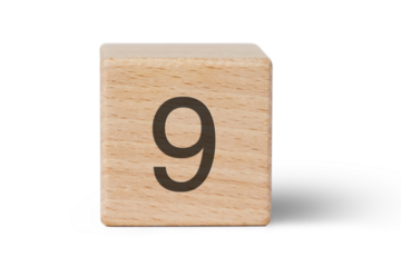 A single wooden block prominently displays a black number nine, isolated cutout from background.