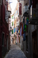 Fototapeta na wymiar A scenic view of a narrow street, Piran