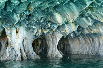 Sculpted blue chapels of  Marble caves or Cuevas de Marmol at General Cerrerra Lake. Location...